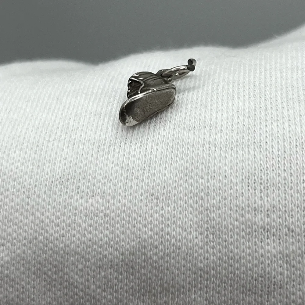 Vintage tiny baby shoe boot Sterling silver charm pendant